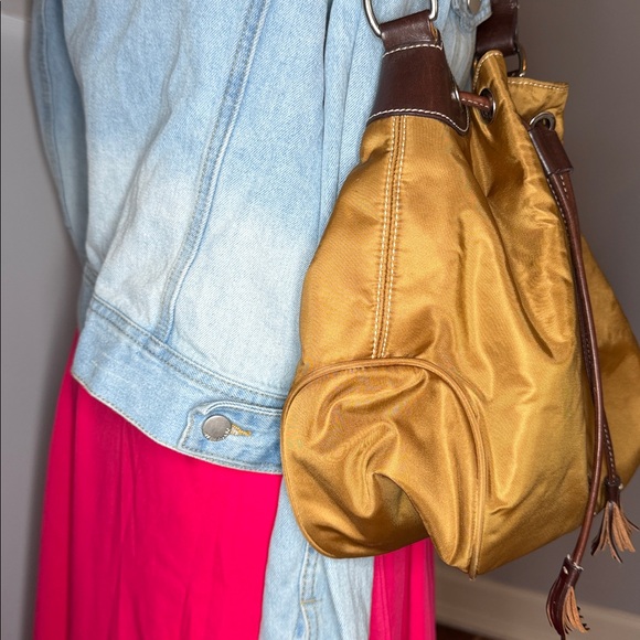 Dooney & Bourke EUC Tan With Brown Nylon Trim Drawstring Bucket Bag - Picture 3 of 7